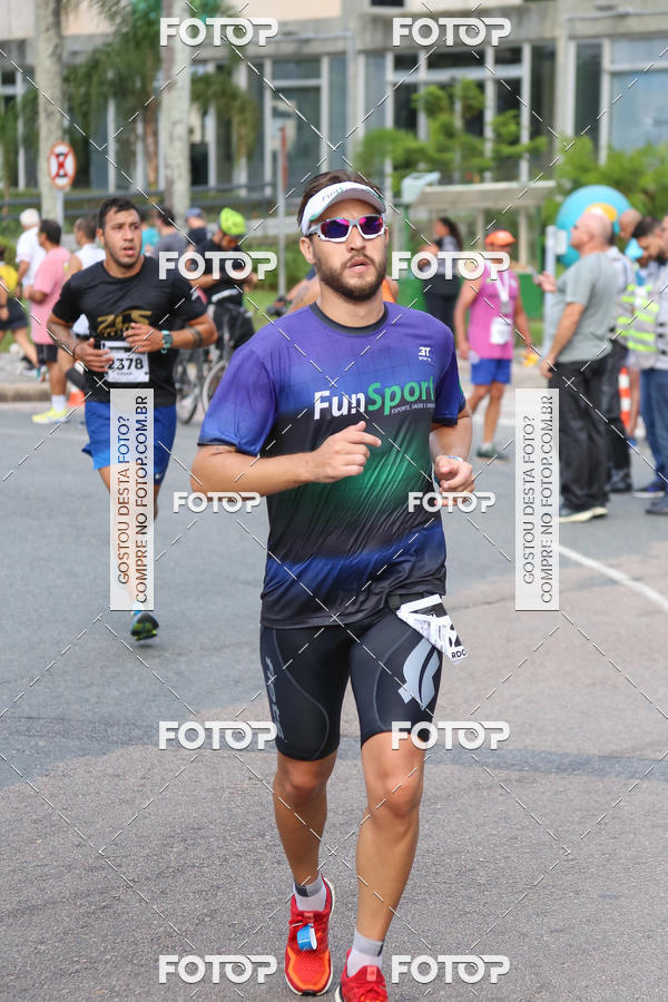 Buy your photos of the eventMeia Maratona Internacional de Curitiba 2018 on Fotop