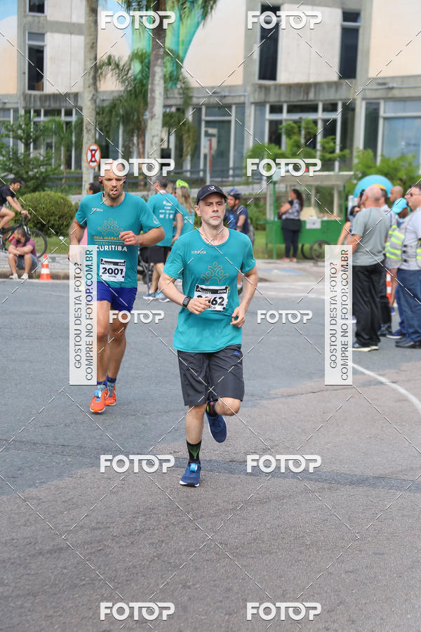 Buy your photos of the eventMeia Maratona Internacional de Curitiba 2018 on Fotop