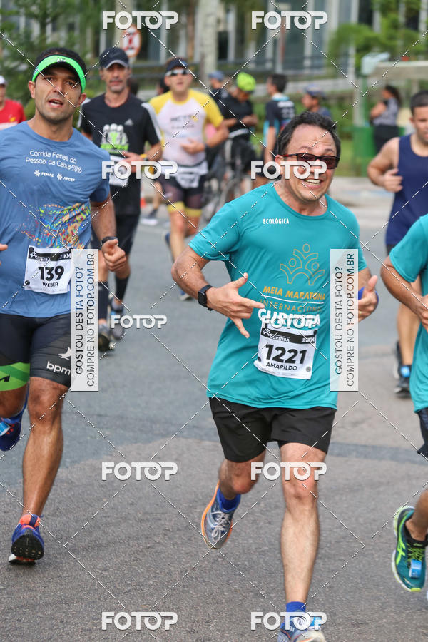 Buy your photos of the eventMeia Maratona Internacional de Curitiba 2018 on Fotop