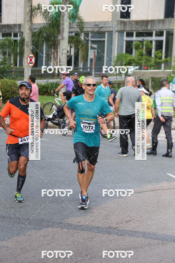Buy your photos of the eventMeia Maratona Internacional de Curitiba 2018 on Fotop