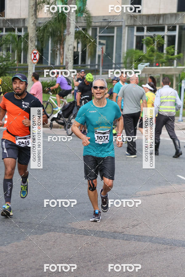 Buy your photos of the eventMeia Maratona Internacional de Curitiba 2018 on Fotop