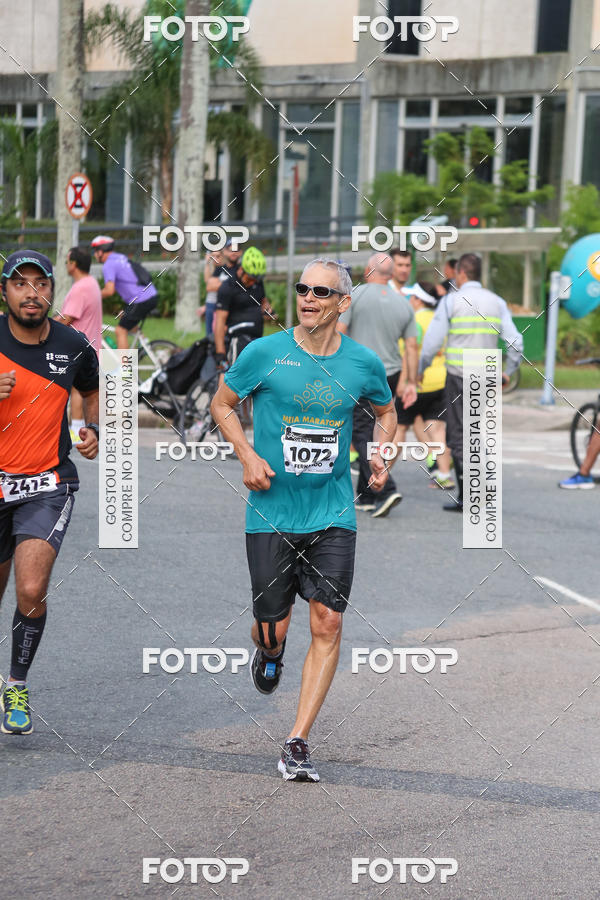 Buy your photos of the eventMeia Maratona Internacional de Curitiba 2018 on Fotop