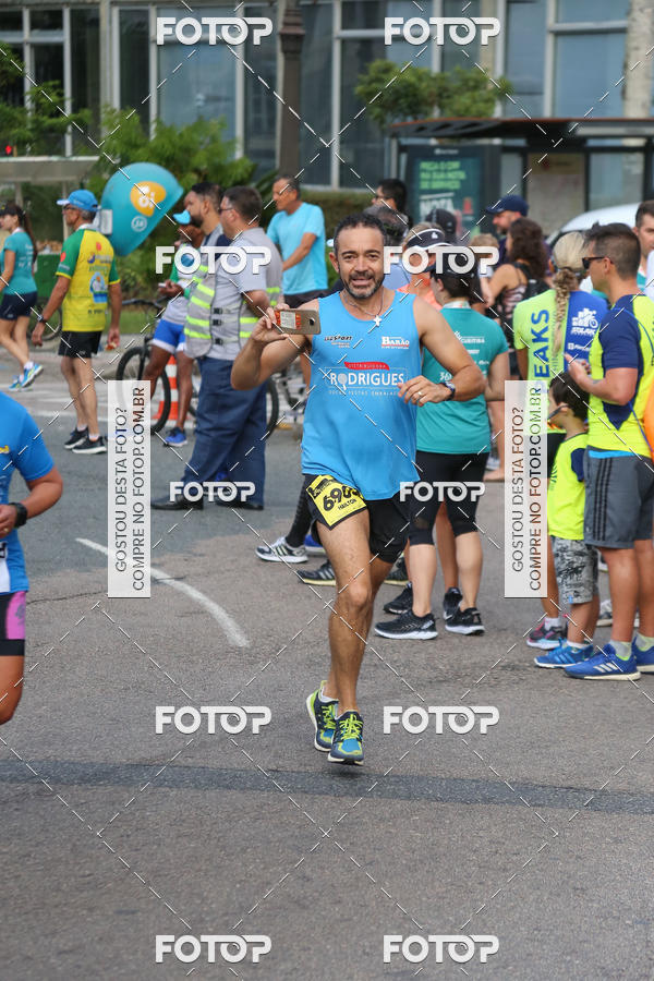 Buy your photos of the eventMeia Maratona Internacional de Curitiba 2018 on Fotop