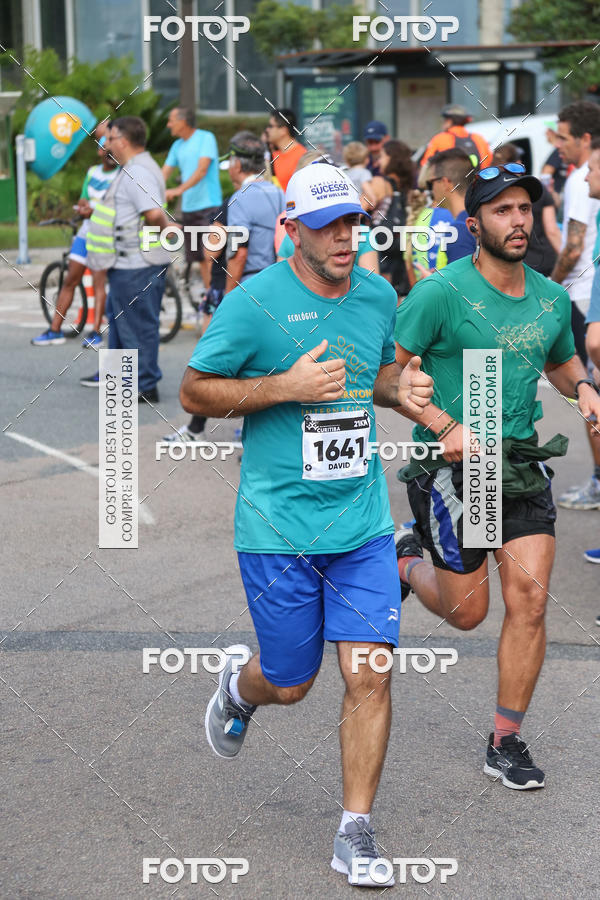 Buy your photos of the eventMeia Maratona Internacional de Curitiba 2018 on Fotop