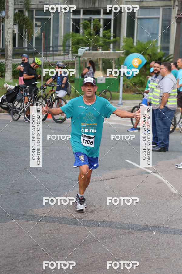 Buy your photos of the eventMeia Maratona Internacional de Curitiba 2018 on Fotop