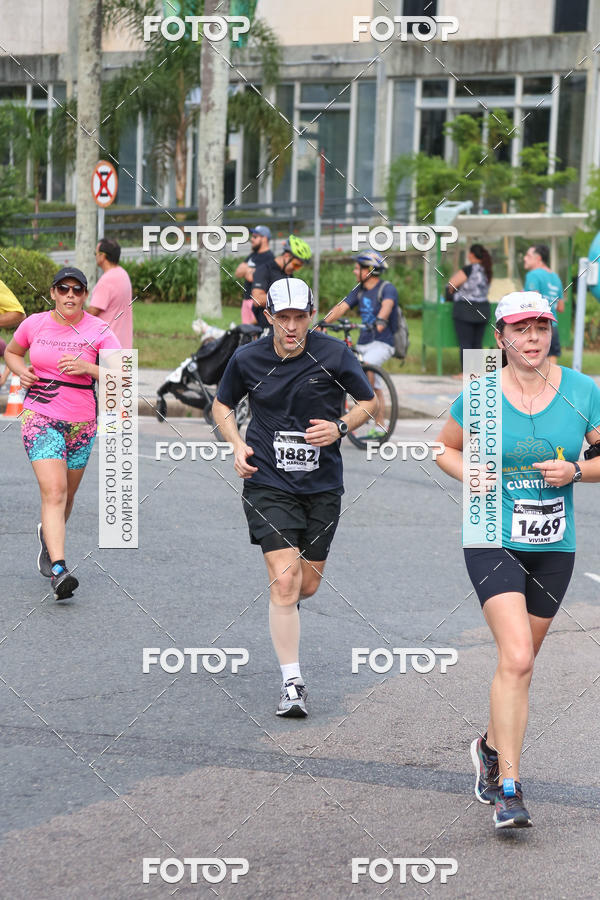 Buy your photos of the eventMeia Maratona Internacional de Curitiba 2018 on Fotop