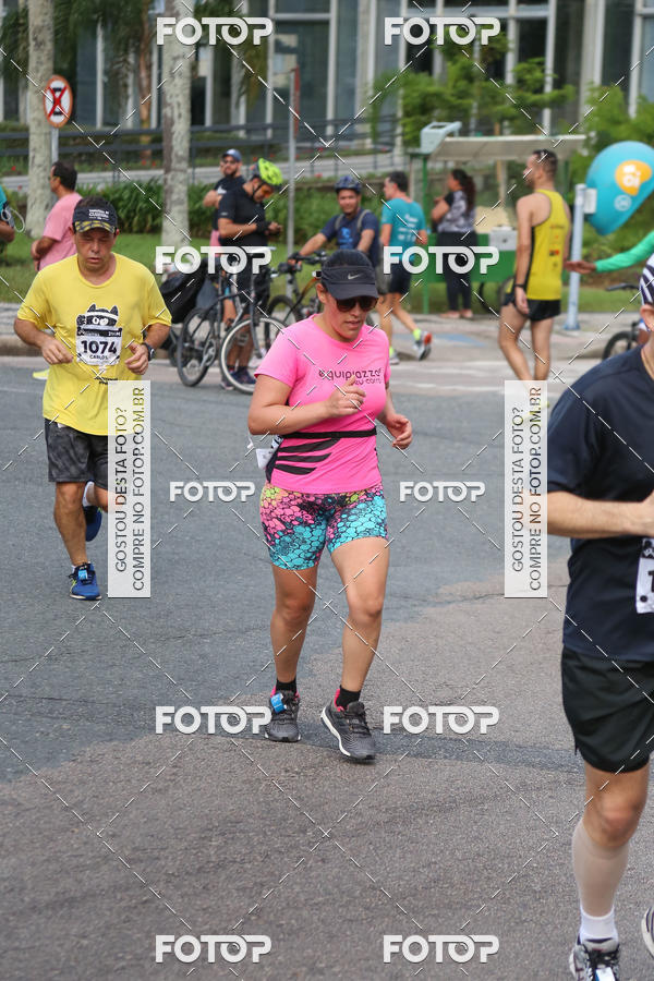 Buy your photos of the eventMeia Maratona Internacional de Curitiba 2018 on Fotop