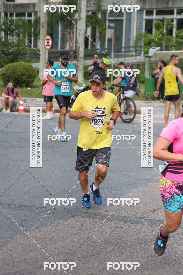 Buy your photos of the eventMeia Maratona Internacional de Curitiba 2018 on Fotop