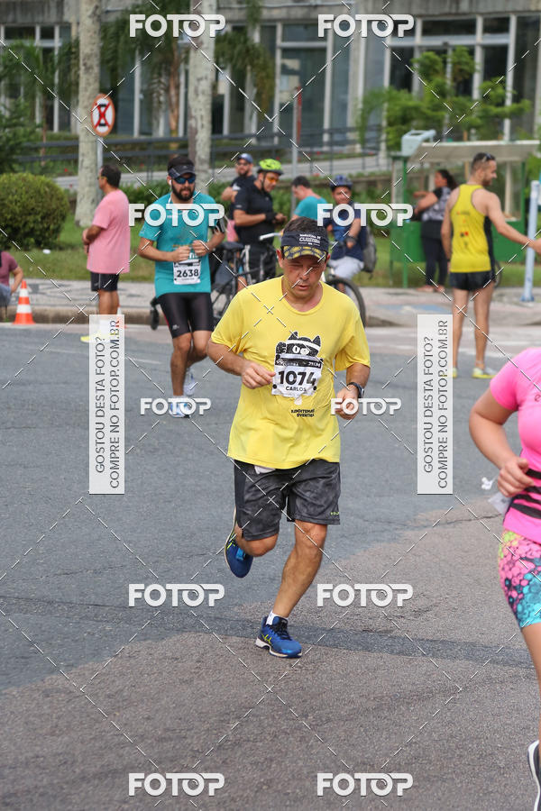 Buy your photos of the eventMeia Maratona Internacional de Curitiba 2018 on Fotop