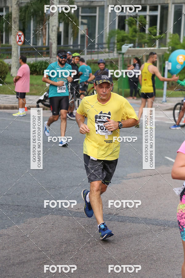Buy your photos of the eventMeia Maratona Internacional de Curitiba 2018 on Fotop