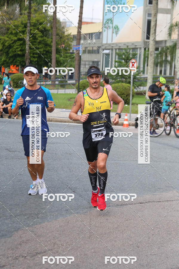 Buy your photos of the eventMeia Maratona Internacional de Curitiba 2018 on Fotop