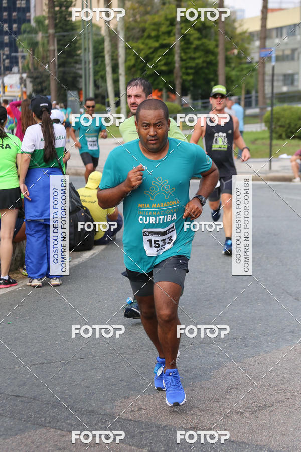 Buy your photos of the eventMeia Maratona Internacional de Curitiba 2018 on Fotop