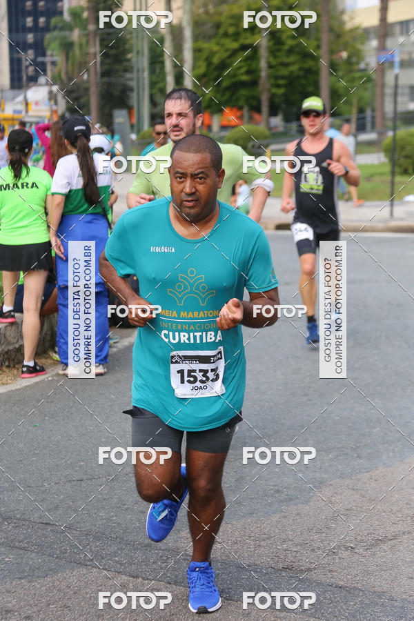 Buy your photos of the eventMeia Maratona Internacional de Curitiba 2018 on Fotop
