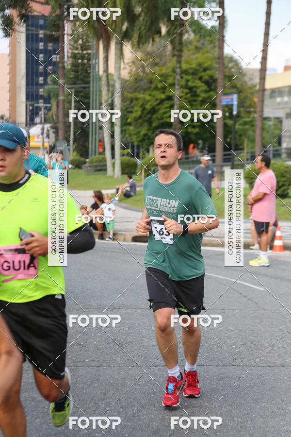 Buy your photos of the eventMeia Maratona Internacional de Curitiba 2018 on Fotop