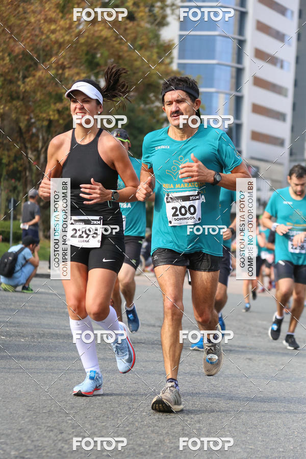 Buy your photos of the eventMeia Maratona Internacional de Curitiba 2018 on Fotop