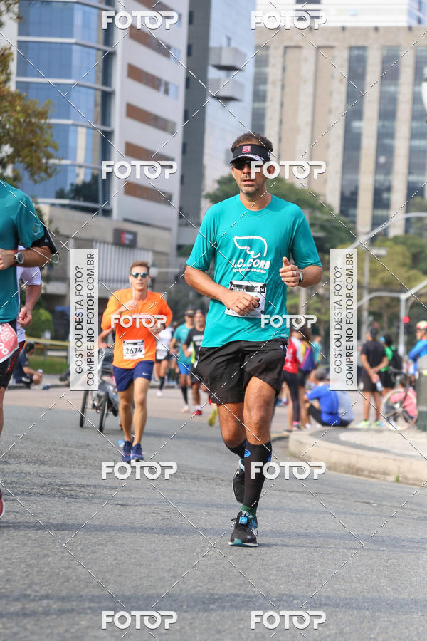 Buy your photos of the eventMeia Maratona Internacional de Curitiba 2018 on Fotop