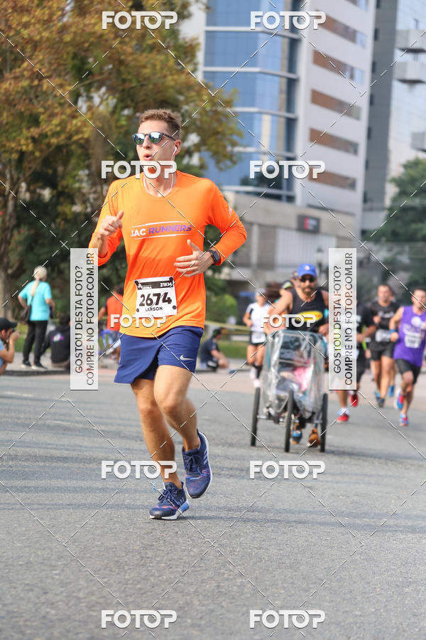 Buy your photos of the eventMeia Maratona Internacional de Curitiba 2018 on Fotop