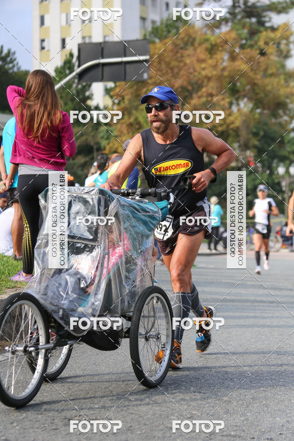 Buy your photos of the eventMeia Maratona Internacional de Curitiba 2018 on Fotop