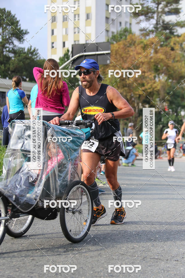 Buy your photos of the eventMeia Maratona Internacional de Curitiba 2018 on Fotop