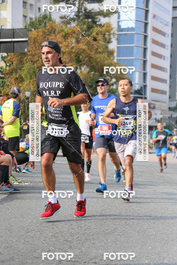 Buy your photos of the eventMeia Maratona Internacional de Curitiba 2018 on Fotop