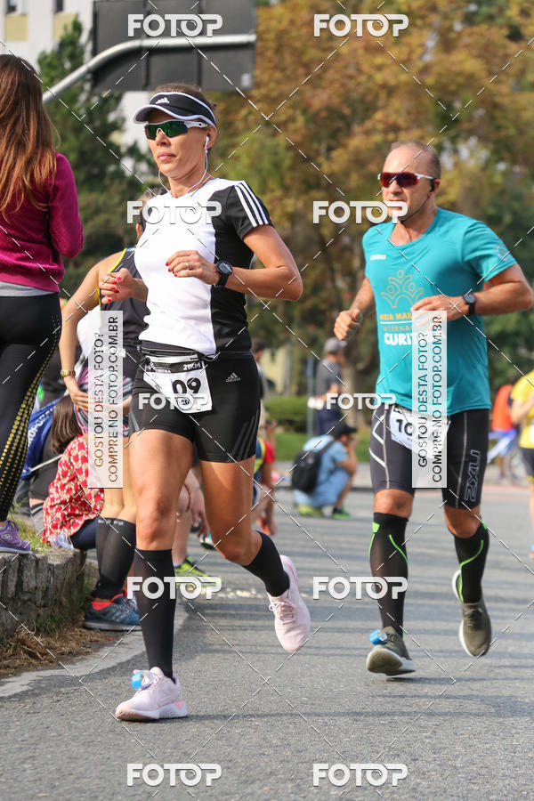 Buy your photos of the eventMeia Maratona Internacional de Curitiba 2018 on Fotop