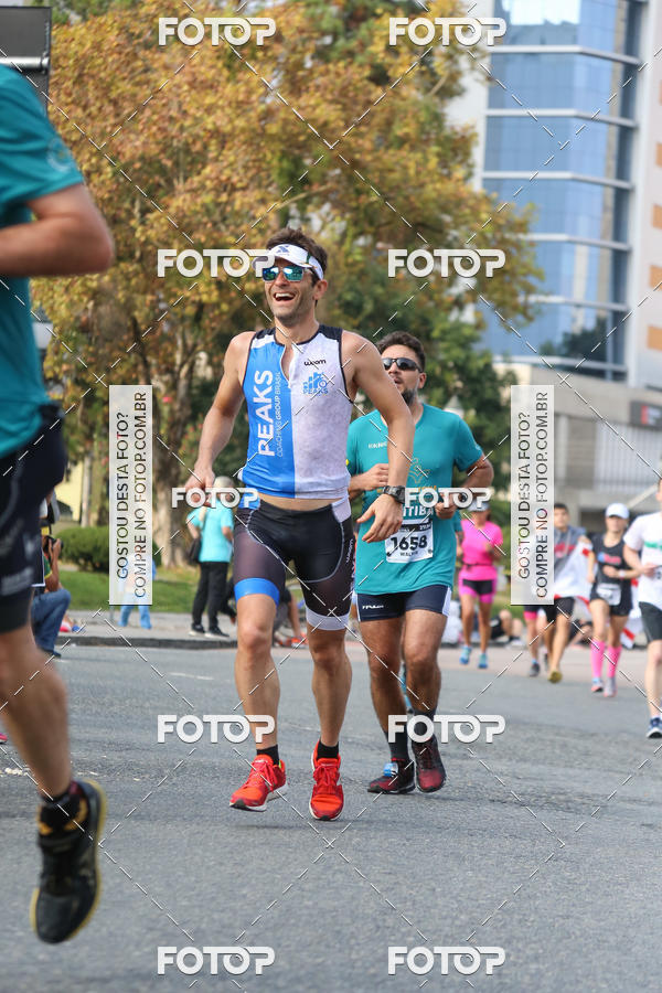 Buy your photos of the eventMeia Maratona Internacional de Curitiba 2018 on Fotop