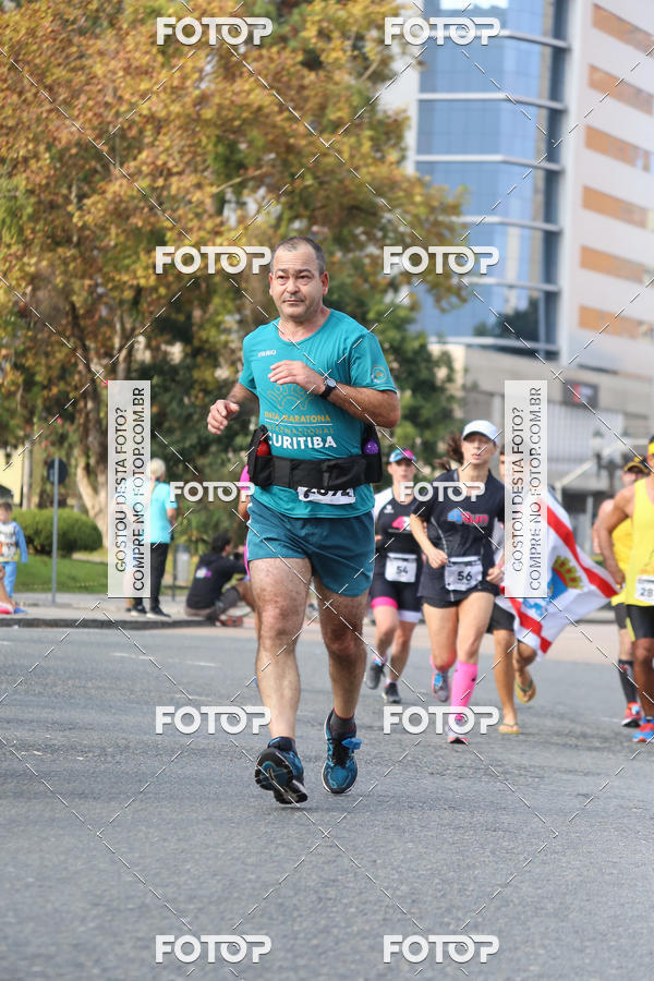 Buy your photos of the eventMeia Maratona Internacional de Curitiba 2018 on Fotop