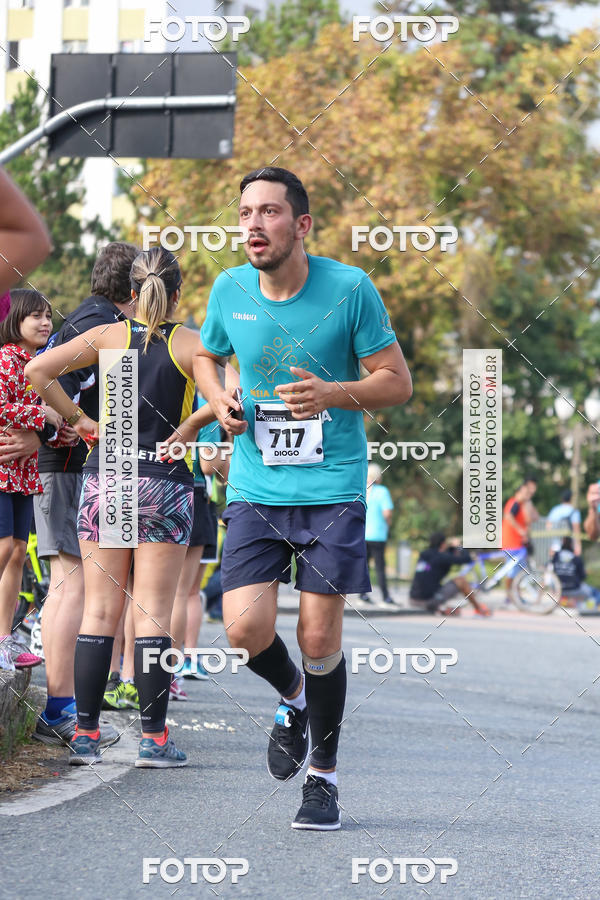 Buy your photos of the eventMeia Maratona Internacional de Curitiba 2018 on Fotop