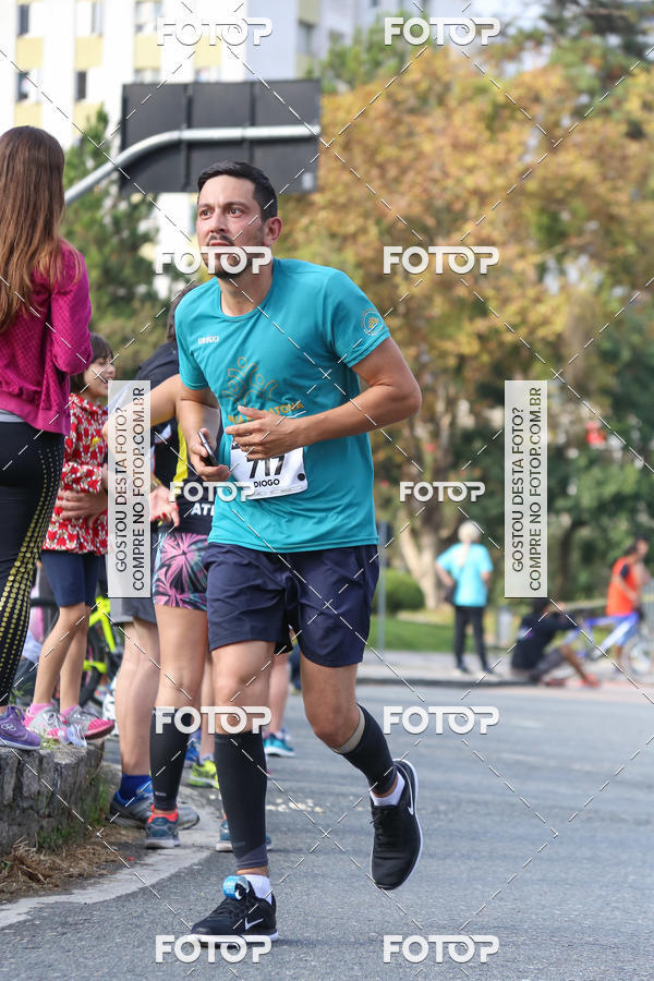 Buy your photos of the eventMeia Maratona Internacional de Curitiba 2018 on Fotop