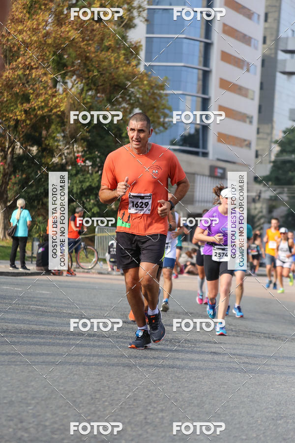 Buy your photos of the eventMeia Maratona Internacional de Curitiba 2018 on Fotop