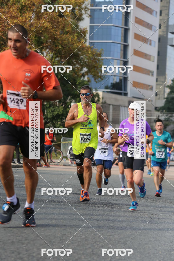 Buy your photos of the eventMeia Maratona Internacional de Curitiba 2018 on Fotop