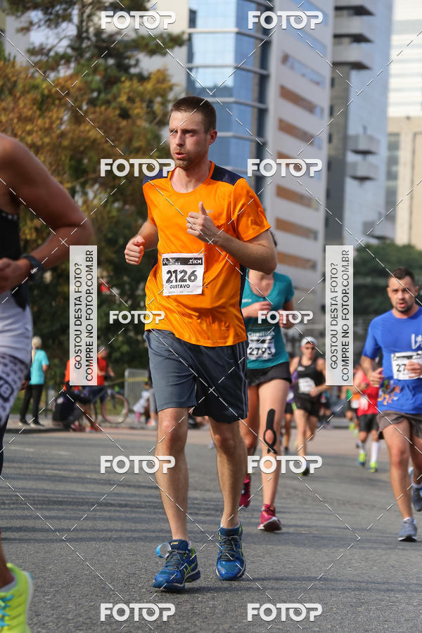 Buy your photos of the eventMeia Maratona Internacional de Curitiba 2018 on Fotop