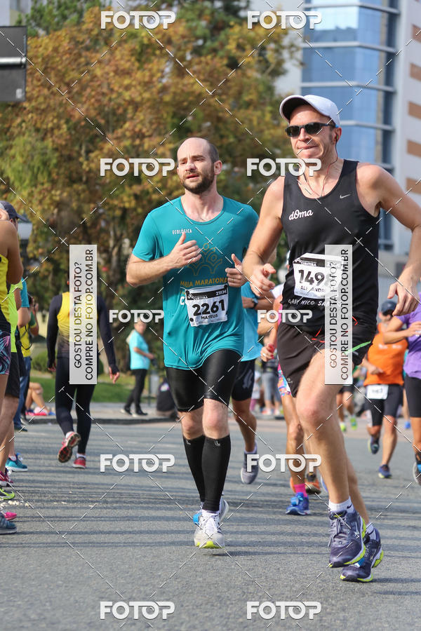 Buy your photos of the eventMeia Maratona Internacional de Curitiba 2018 on Fotop