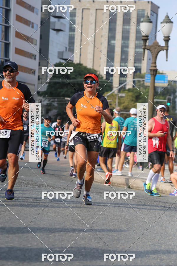 Buy your photos of the eventMeia Maratona Internacional de Curitiba 2018 on Fotop
