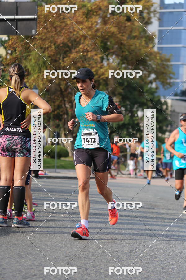 Buy your photos of the eventMeia Maratona Internacional de Curitiba 2018 on Fotop