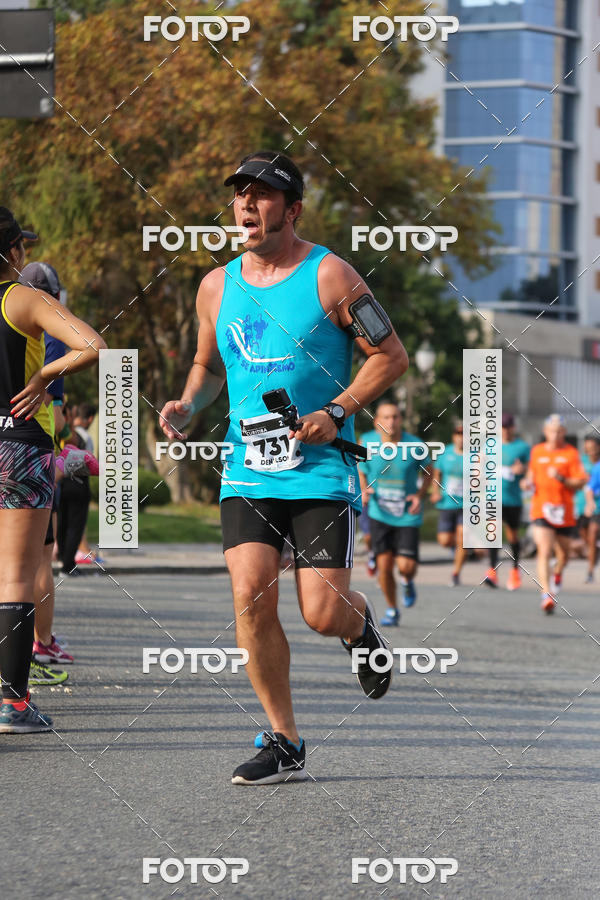 Buy your photos of the eventMeia Maratona Internacional de Curitiba 2018 on Fotop
