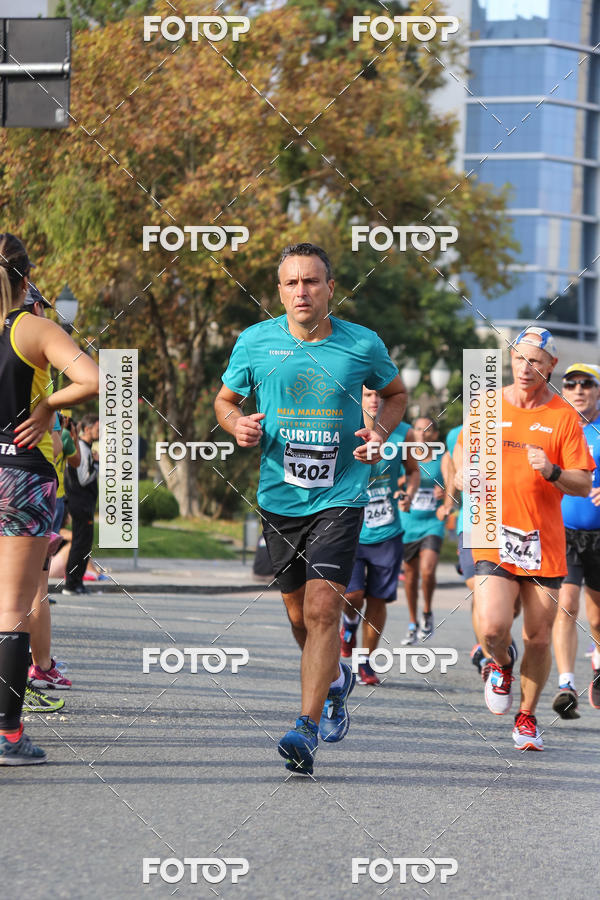Buy your photos of the eventMeia Maratona Internacional de Curitiba 2018 on Fotop