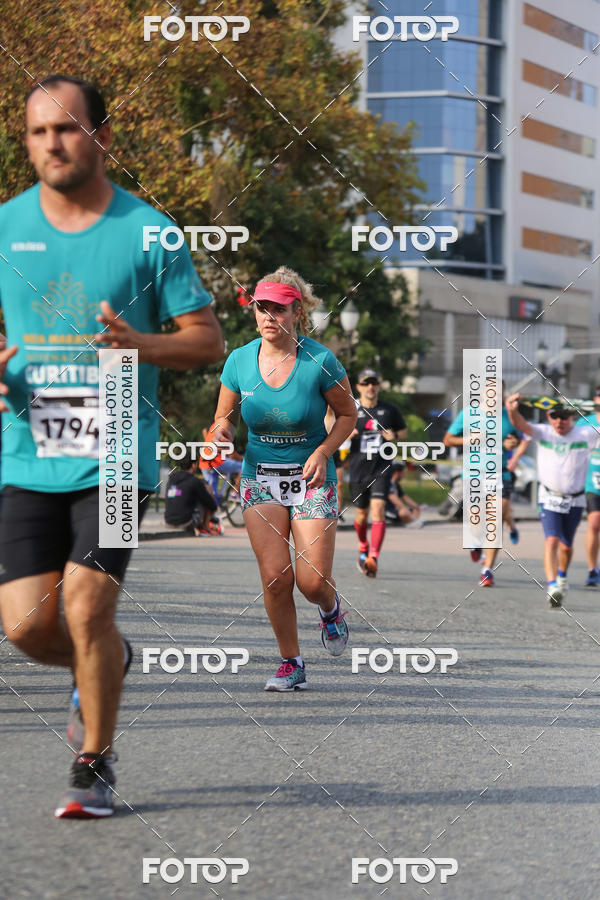 Buy your photos of the eventMeia Maratona Internacional de Curitiba 2018 on Fotop