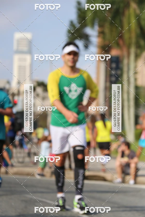 Buy your photos of the eventMeia Maratona Internacional de Curitiba 2018 on Fotop