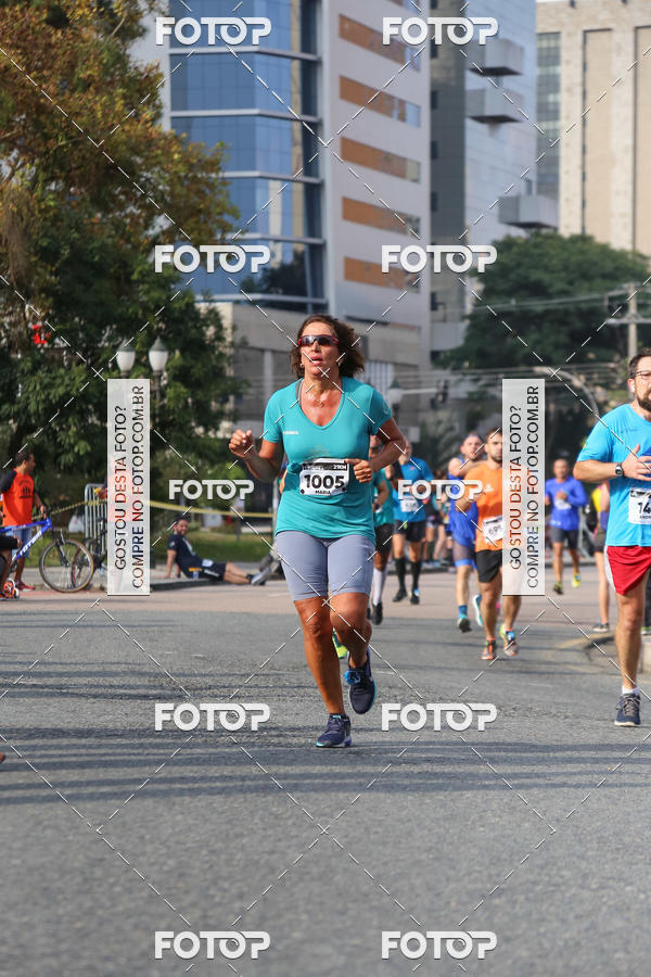 Buy your photos of the eventMeia Maratona Internacional de Curitiba 2018 on Fotop