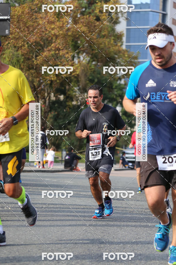 Buy your photos of the eventMeia Maratona Internacional de Curitiba 2018 on Fotop