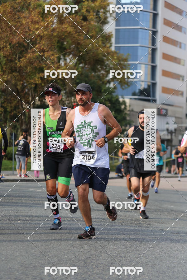 Buy your photos of the eventMeia Maratona Internacional de Curitiba 2018 on Fotop