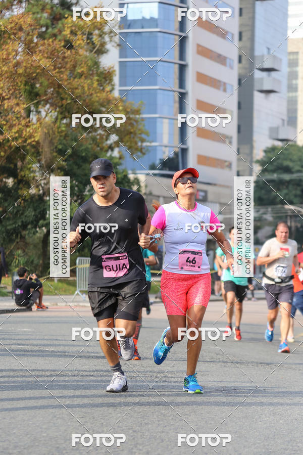 Buy your photos of the eventMeia Maratona Internacional de Curitiba 2018 on Fotop