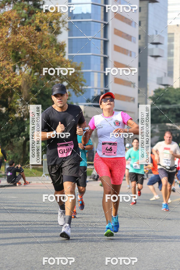 Buy your photos of the eventMeia Maratona Internacional de Curitiba 2018 on Fotop