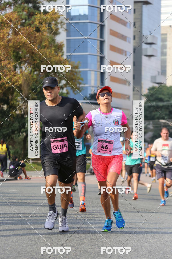 Buy your photos of the eventMeia Maratona Internacional de Curitiba 2018 on Fotop