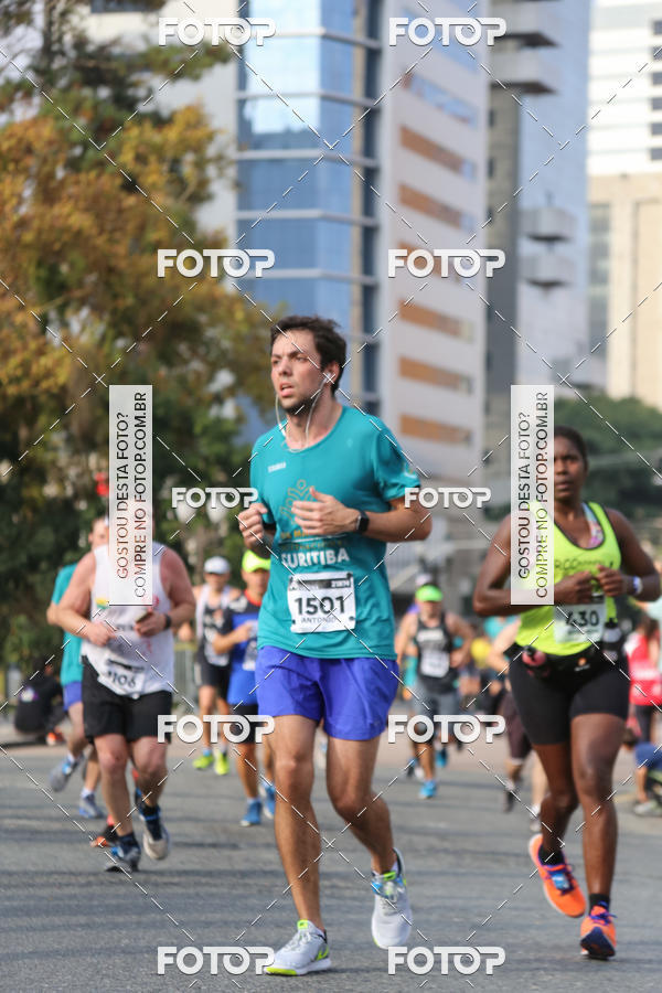 Buy your photos of the eventMeia Maratona Internacional de Curitiba 2018 on Fotop
