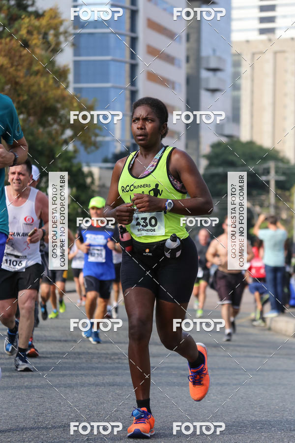 Buy your photos of the eventMeia Maratona Internacional de Curitiba 2018 on Fotop