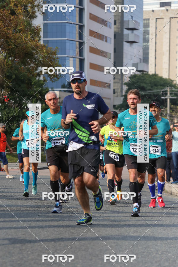 Buy your photos of the eventMeia Maratona Internacional de Curitiba 2018 on Fotop