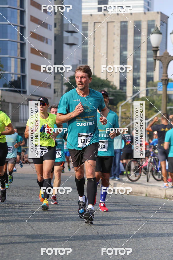 Buy your photos of the eventMeia Maratona Internacional de Curitiba 2018 on Fotop