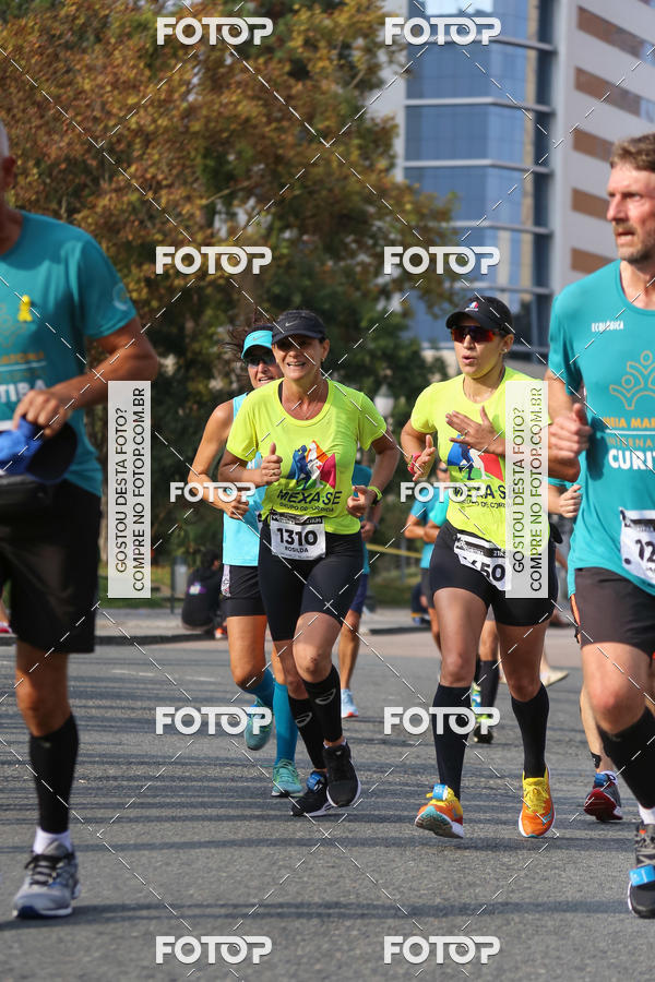 Buy your photos of the eventMeia Maratona Internacional de Curitiba 2018 on Fotop